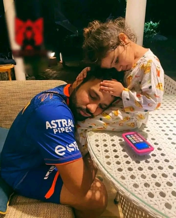 Personal - All the grief, sorrow and struggle of a warrior for so many days to win WC for country has come to an end in lap of a lovely daughter. It is a very touching picture, full of infinite emotions. The energy received from daughter will inspire this warrior to fight again.