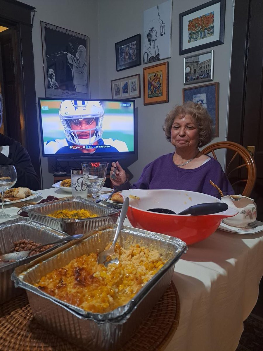 Dak Prescott really looks like he can't wait to get at my Auntie's food! HAHAHAH! This might be the cutest Thanksgiving picture ever.