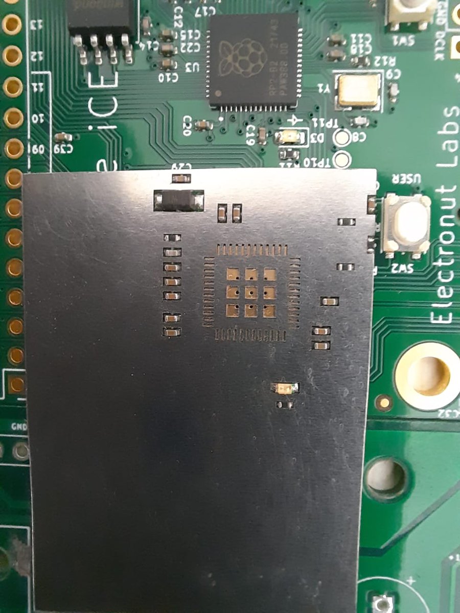 .<a href="/SivaPrakazh/">Sivaprakash</a> assembling FPGA on to the partially assembled board from <a href="/JLCPCB/">JLCPCB</a> . We ordered too large a stencil, so he had to cut it... 🙂