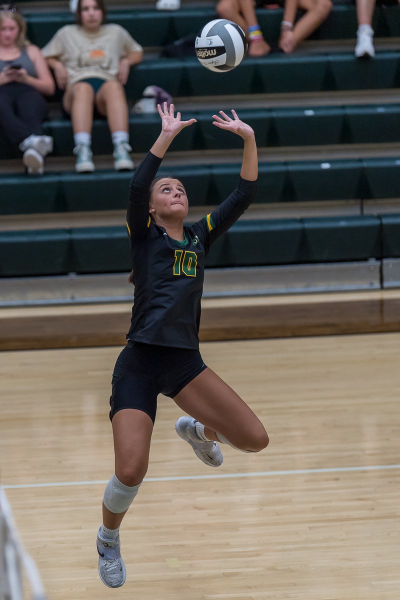 Medina's <a href="/ClaireKolesar/">claire kolesar</a> moves to make the set against Highland. <a href="/MGVBladybees/">Medina Girls Volleyball</a>