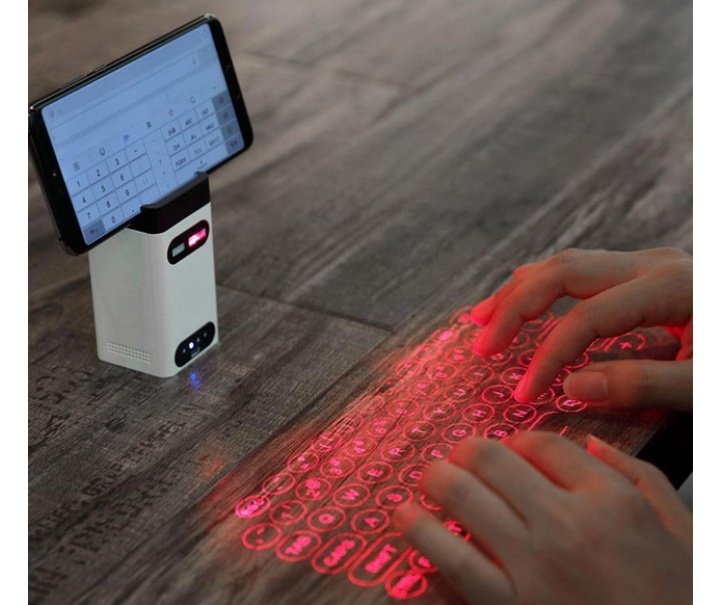 LASER KEYBOARD PROJECTOR Hii ni kama keyboard cha utofauti na zingine hii haishikiki (virtual) ambapo ukitaka kutype neno basi yenyewe inauwezo wa kujua (SENSE) umechagua herufi gani Cha ajabu sasa ........