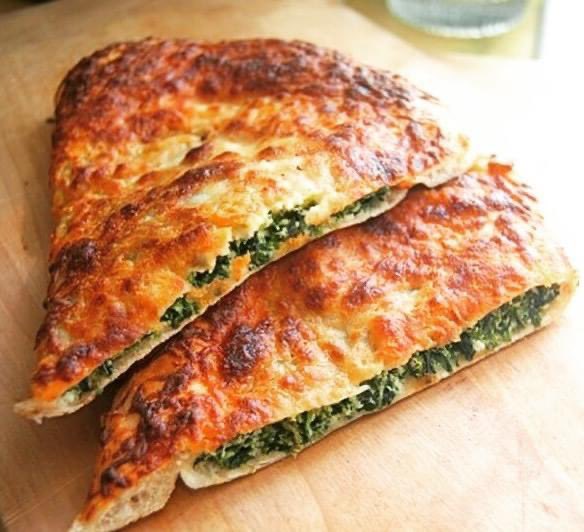 FoodieCity's tweet photo. Spinach Ricotta Calzone @FoodieCity #calzone #spinachcalzone #lunchideas #foodiecitynetwork #cravetasteeat #delicious
What's a calzone? Simply put, it's pizza crust wrapped around its topping, rather than supporting it from beneath.
#recipe -https://t.co/JCrMAzBX8x https://t.co/vV3D5frPsk