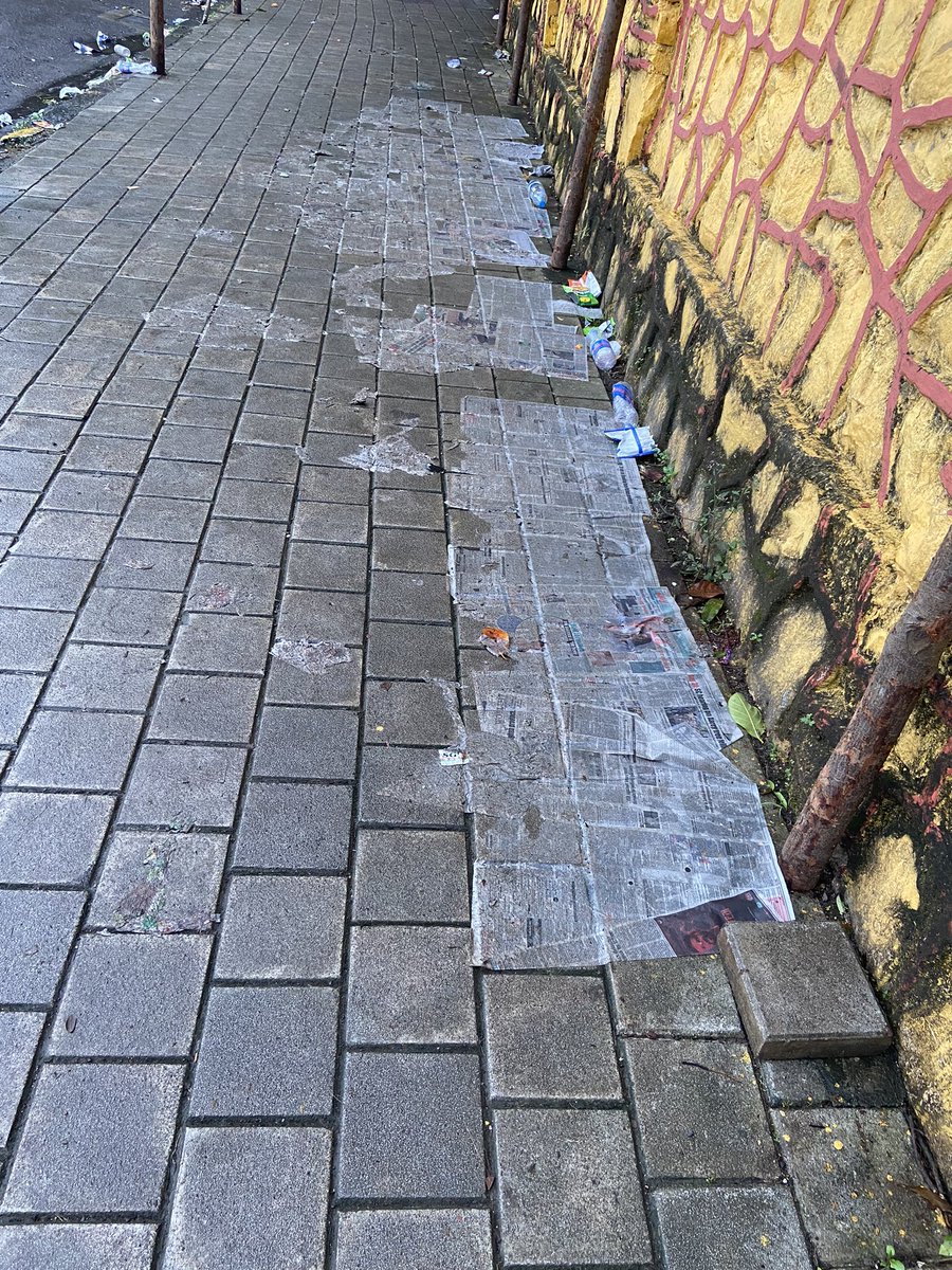 Som_ThinkTag's tweet photo. This is what people do to our own streets. My guess- they were waiting to get inside Siddhivinayak temple,got newspapers to sit on &amp; conveniently forgot to clear them. Now @mybmc will have 2clean papers stuck to the ground with rains.@mybmcWardGN #SwachhBharat #shameless #menace https://t.co/1uumUNj2iw