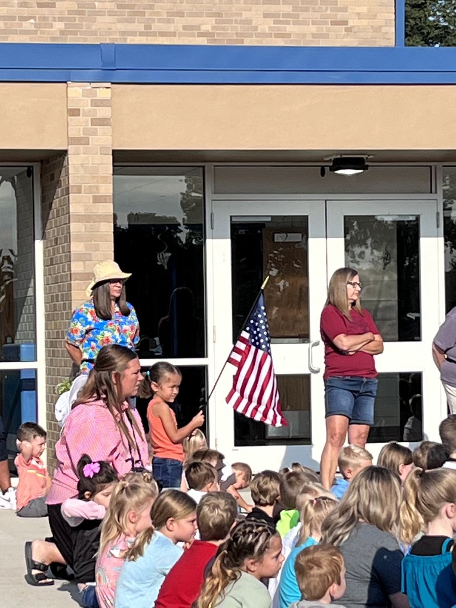 The elementary started the morning with the Pledge of Allegiance and the ringing of the bell. #UWoodEaglePride