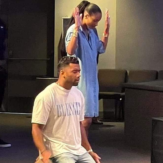 It's an honor to see Russell Wilson and his wife Cierra praying together.  The family that prays together, stays together.  God is good all the time. Much success.