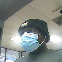 FBIHouston's tweet photo. Recognize him? This man is wanted for the 8/13/22 armed robbery of First Convenience Bank at 5801 S Gessner Rd. He's described as a Black man in his early 20s, about 5’7”. He wore a long-sleeve gray shirt, black beanie, blue latex gloves, khaki pants, black boots, surgical mask. https://t.co/5JQvse99hA