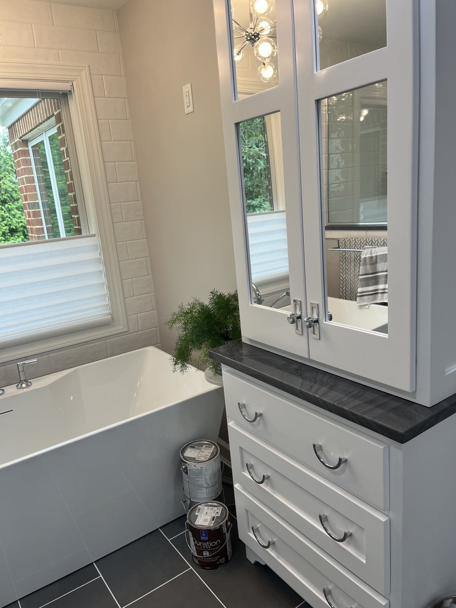 LlcStoneware's tweet photo. Happy Tuesday! This stone is called Wakanda 😍. It is black with gray and white veins that make it look like it has a wave effect. #granite #bathroom #cabinets #quartz #marble #Trending https://t.co/atN4ldRZ3b