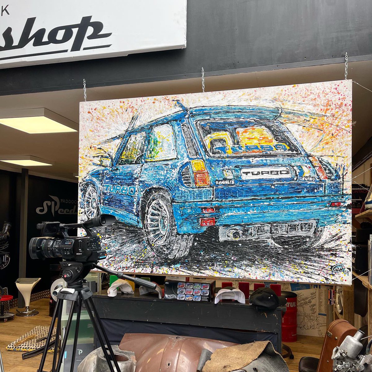 Popbangcolour's tweet photo. Over the Paddock Speedshop with paddock life today doing a bit of filming - it’s an Aladdin cave of goodness 
👀🚗👍🏻

I spy a couple of #Paintwithcars on display 🎨

#PaddockLife #PaddockSpeedshop https://t.co/dLgJMegzTR