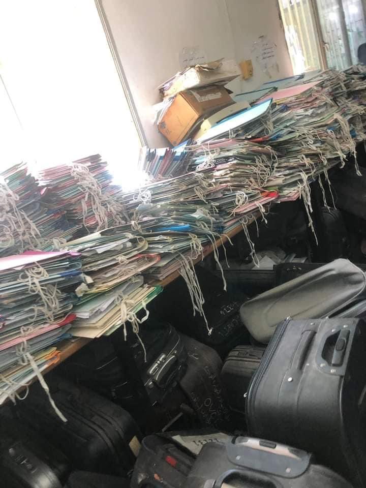 LinaZhaim's tweet photo. This is what the Lebanese Corporate Registry Records in Beirut looks like and this is how archives are preserved… in travel luggage. This is what our politicians have turned the public administration into, and this is how they manage the affairs of the 🇱🇧 people. https://t.co/9MaAGsuSiE