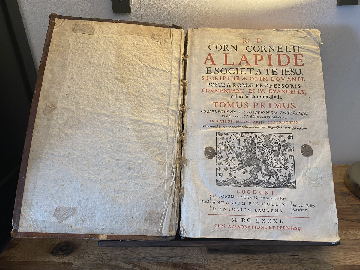 overleaf's tweet photo. Our developer Alex went to a yard sale and found this book: a Gospel commentary printed in Lyon in 1681 β what an amazing find, the typography is simply gorgeous! ππ Newer versions can definitely benefit from #TeXLaTeX. π π π #OverleafFamily https://t.co/zjBxLB5hTx