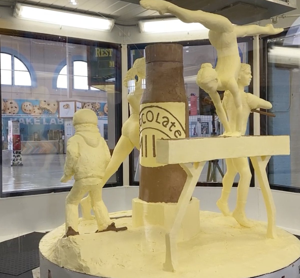 syracusedotcom's tweet photo. SPOILER ALERT: The butter sculpture has been unveiled at the New York State Fairgrounds! This year’s theme is "Refuel Her Greatness — Celebrating the 50th anniversary of Title IX.” What do you think of this year's sculpture? https://t.co/3q1m7D4syQ