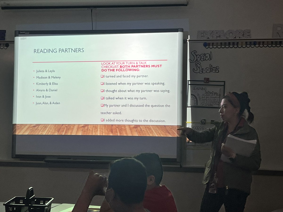O. Sampson reviewing turn and talk checklist for her 5th grade <a href="/AE_Gators/">Armstrong Elementary</a> to use as they engage in partner reading and using think marks.
