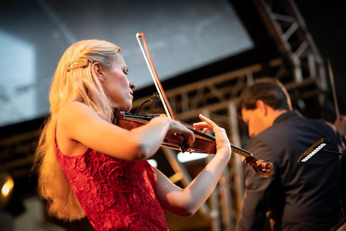 eldbjorgmusic's tweet photo. I had a blast performing at Trädgården (usually an ultra-popular, outdoor nightclub) last Friday! It was so unique to perform Anders Hillborg's Violin Concerto no. 2 with a full symphony underneath the enormous arches of the Skanstull bridge in Södermalm! https://t.co/eXeX0CZwZp