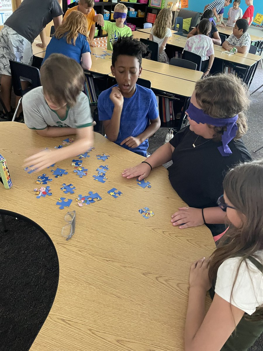 MissMeuser16's tweet photo. Collaborative Puzzle activity to learn how to effectively communicate in a group when faced with adversity…aka a blindfolded team leader! Love this group and their determination already! https://t.co/nQd9PdvL8p