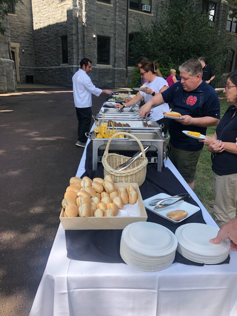 HolyGhostPrep's tweet photo. Among the many highlights of today's @HolyGhostPrep  Faculty/Staff In-Service Day were the honoring of math teacher extraordinaire Gerri Carmine on her 25 years of service to HGP and a @CulinArtGroup BBQ lunch prepared by Chef Jorge and his team. #ThinkCommunity #ThinkGhost https://t.co/Kn7A4r8ncx