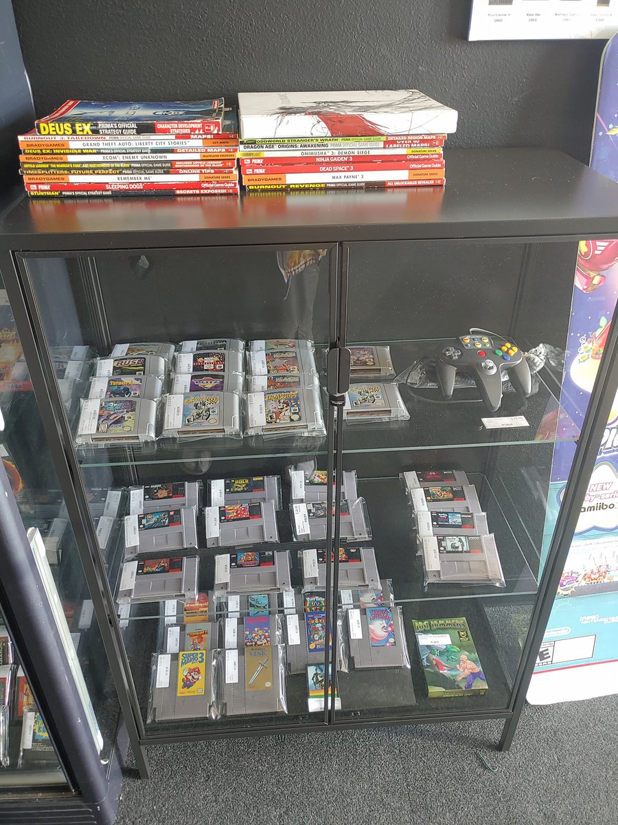 RetroGameVault's tweet photo. The Retro Game Vault here! Check out my new display cases! I'm always processing stuff so it's always worth stopping by 😉 BTW it's been a while since I have had a sale, so all those Nintendo switch games are 10% off today, tomorrow, and Thursday! we are open 12-7 Monday-Saturday https://t.co/TX6VVFczEg