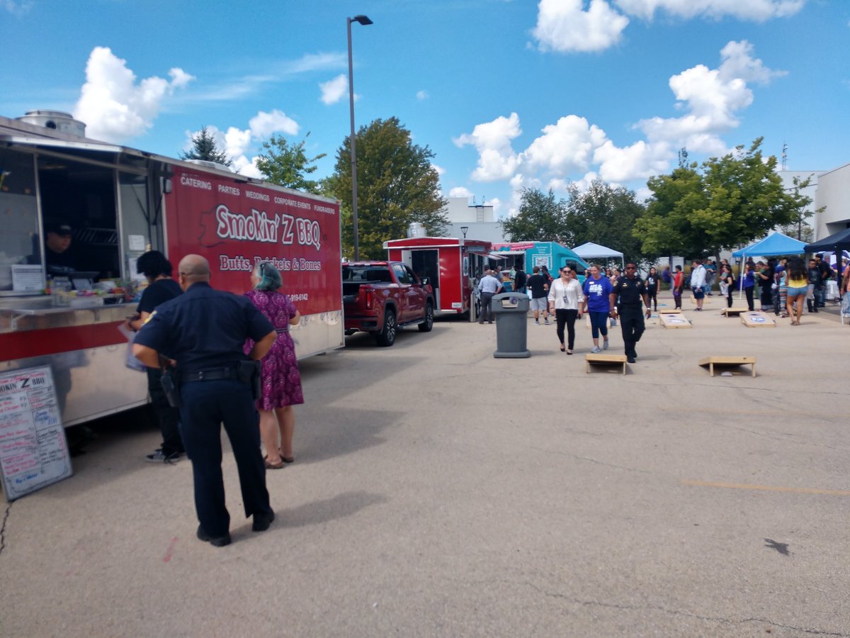 jjcwolves's tweet photo. Great Block Party on the JJC campus as a part of Welcome Week 2022 for the students and staff.  Music, food trucks and so much more. Of course women's basketball coach Shaun Sanderson and his huge nachos runs into President Dr. Namuo. https://t.co/CelcbwL9LC