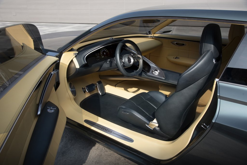 UltimativCars's tweet photo. Stumbled a @MotorAuthority-post, calling cockpit of the #Genesis #XSpeedium concept-car "an asymmetrical interior design w/ a driver-oriented layout", which shows the normal shape, we mostly like "in the past".

So, keep it so, cut the EV-crap of your lineup - and we'll be fine. https://t.co/4tV4oFKegv