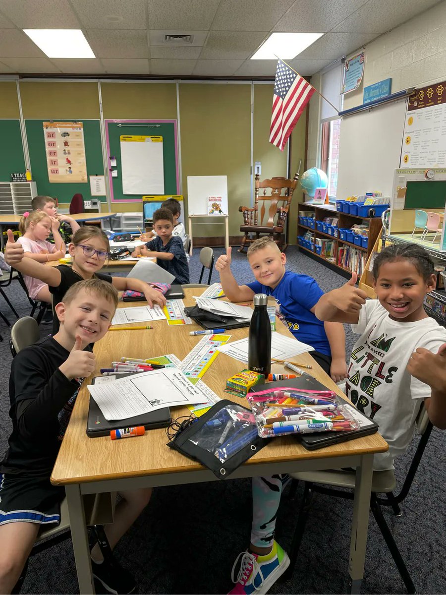 SMFSchools's tweet photo. Mrs. Mormino and her students are all smiles for the new school year! 😁 They are finishing off this beautiful Tuesday with a fun coloring activity to get to know each other better. Such a fun idea! #BuildingBetterBulldogs #BackToSchool #BulldogsAreBack #SMFProud https://t.co/6UEvG2Z0w3