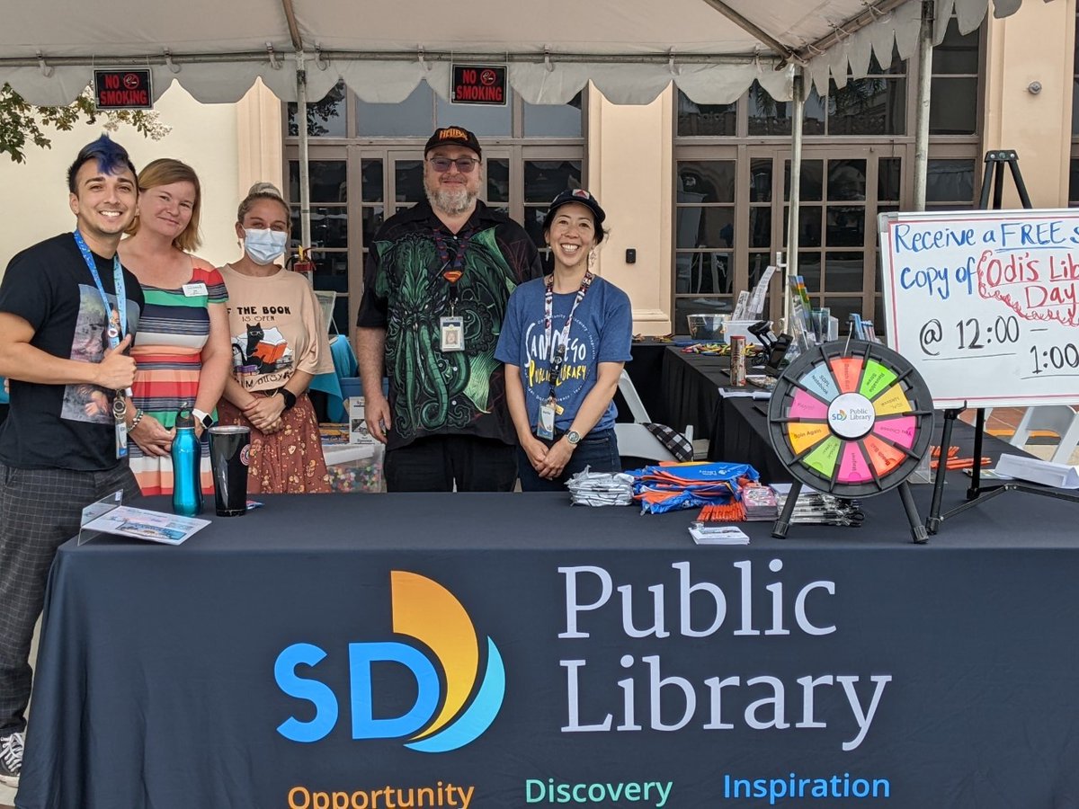 SDPublicLibrary's tweet photo. Shout-out to all the staff who made our booth at the Festival of Books @sdutfob a success! Hundreds of folks stopped by and learned not only about SDPL, but many also got to meet #OdiTheCoyote & "Odi's Library Day" writer-illustrator duo @hunterahackett & @anisibaigude! ❤️ https://t.co/Z1PeCqkoZi