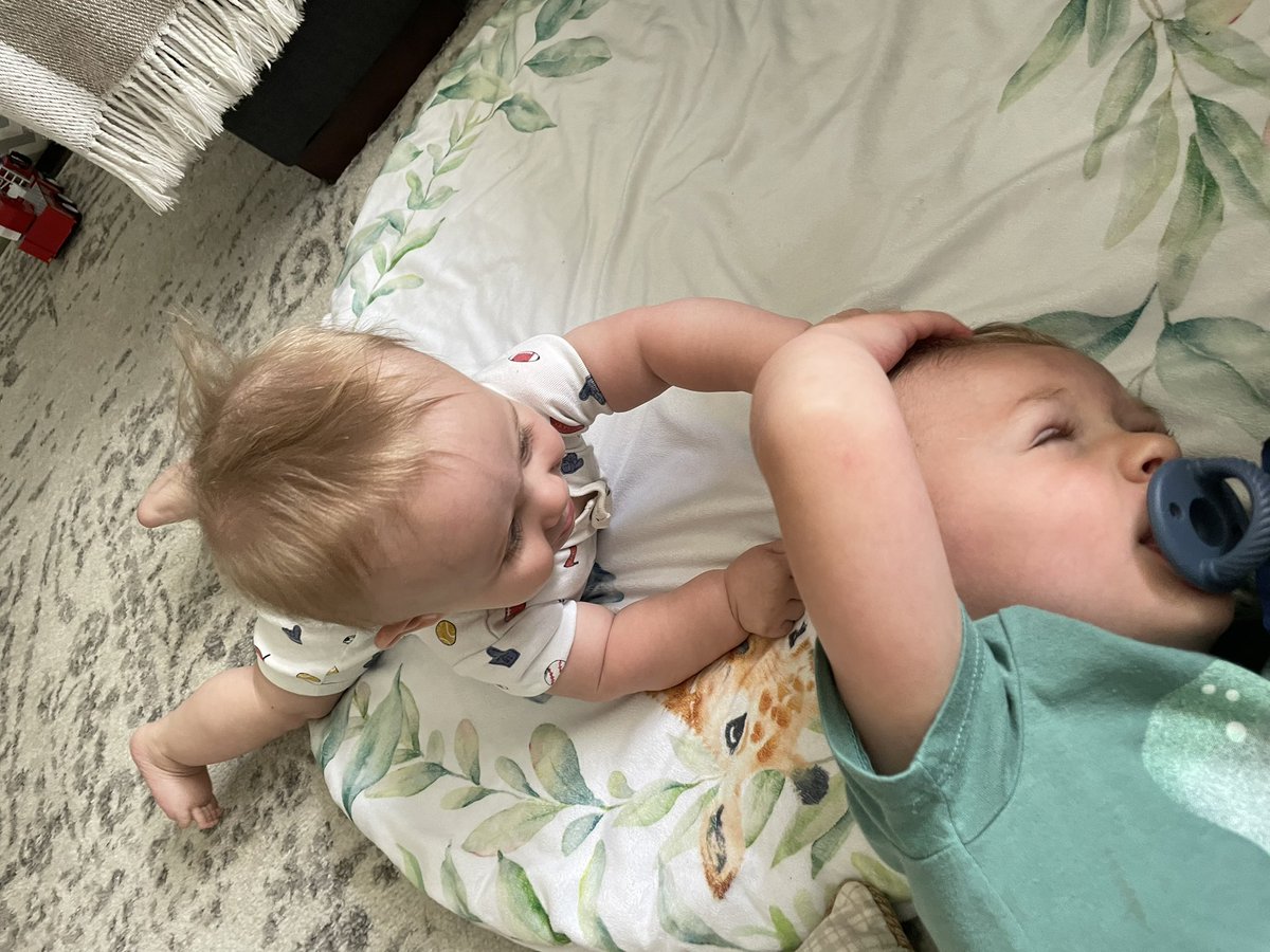cierramersh's tweet photo. It’s a BIG day in the Mershman household! Pierce has learned to fight back…..we’ll work on the hair grabbing later. TJ was not excited about his brothers development. @Coach_Mershman you would be so proud https://t.co/lcliUiwexG