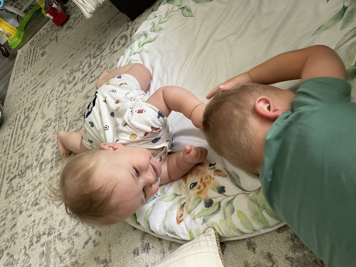 cierramersh's tweet photo. It’s a BIG day in the Mershman household! Pierce has learned to fight back…..we’ll work on the hair grabbing later. TJ was not excited about his brothers development. @Coach_Mershman you would be so proud https://t.co/lcliUiwexG