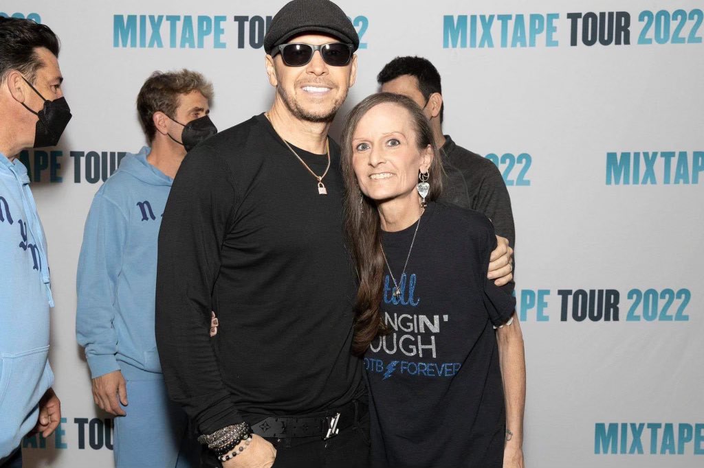 MorganStrebler's tweet photo. Nikki and @DonnieWahlberg at @NKOTB concert in St Louis. He made her dying wish come true. Thank you sir! R.i.P my friend. 😢 https://t.co/8ypLGUNm7R