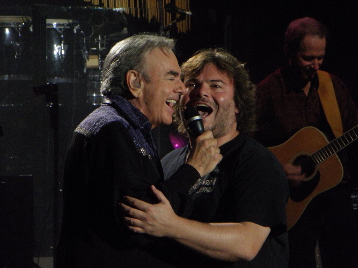 Bev38Law's tweet photo. Just sharing a couple of photos my husband took 10 years ago of Neil Diamond at The Greek Theatre. What great shows those were, and how fun to have Jack Black join Neil on stage! https://t.co/ftJUP9Qudo