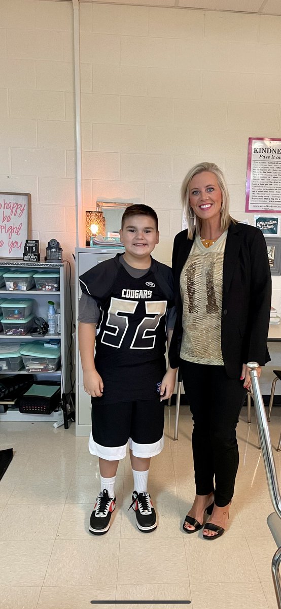 leigha_moltz's tweet photo. It’s game day and this awesome student of mine asked me to wear his practice jersey! I’m honored! @FootballCHMS #WeAreChristiana #ChristianaIsTheBEST #GoCougars https://t.co/igUeUfIZPm