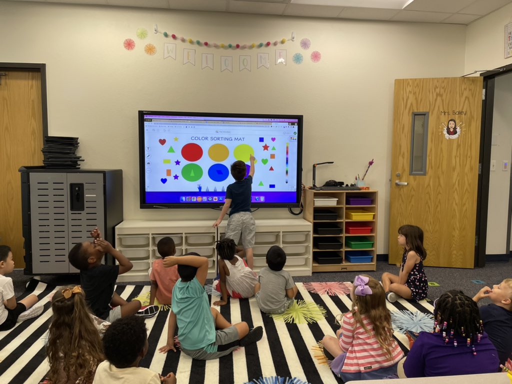 Kindergarten Students practicing Seesaw activities on the vivtek board before they practice them independently on the iPads. #wearemcneil #Kindergarten
