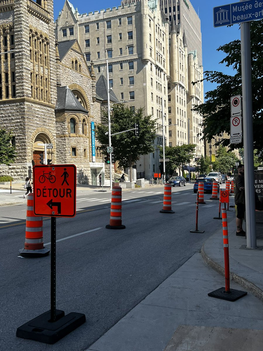 Almost every major thoroughfare I came across in Montreal had a separated two-way bike track, most with a curb separator, some with flex posts. I saw no painted-line only bike lanes. Also, I saw no sidewalks closed for construction that didn’t include a bypass.