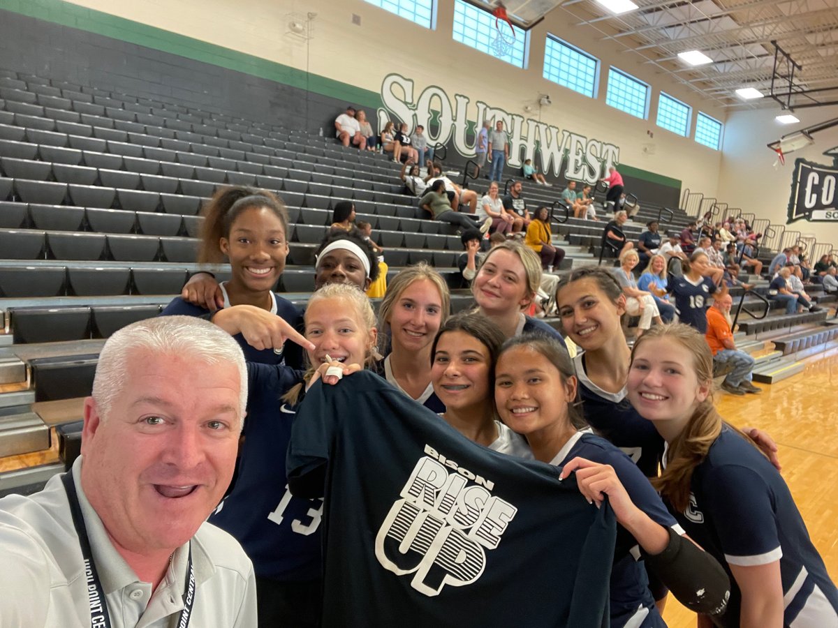 HPCHighSchool's tweet photo. When you go to your PREVIOUS school to watch your CURRENT school and your CURRENT school’s volleyball players come flying over to me to cheer and present a volleyball shirt! 💙 I love High Point Central. @GCSchoolsNC @HPCBisonSports @leighjones23   @hettenm https://t.co/tp92uqpVpr