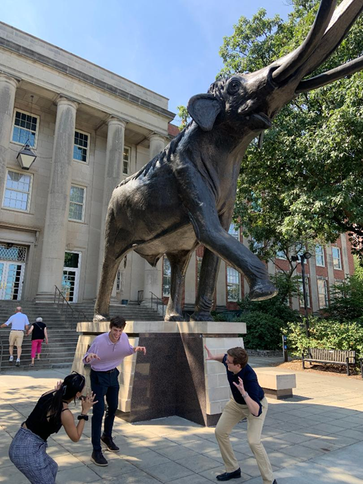 ProfSJF's tweet photo. Builders pose as velociraptors and their frightened prey! Getting out of their comfort zone, as they should. #crazyfirstdayofclass #unlbuilders #unl #nebraskabiz https://t.co/ruQ5vcuVLJ