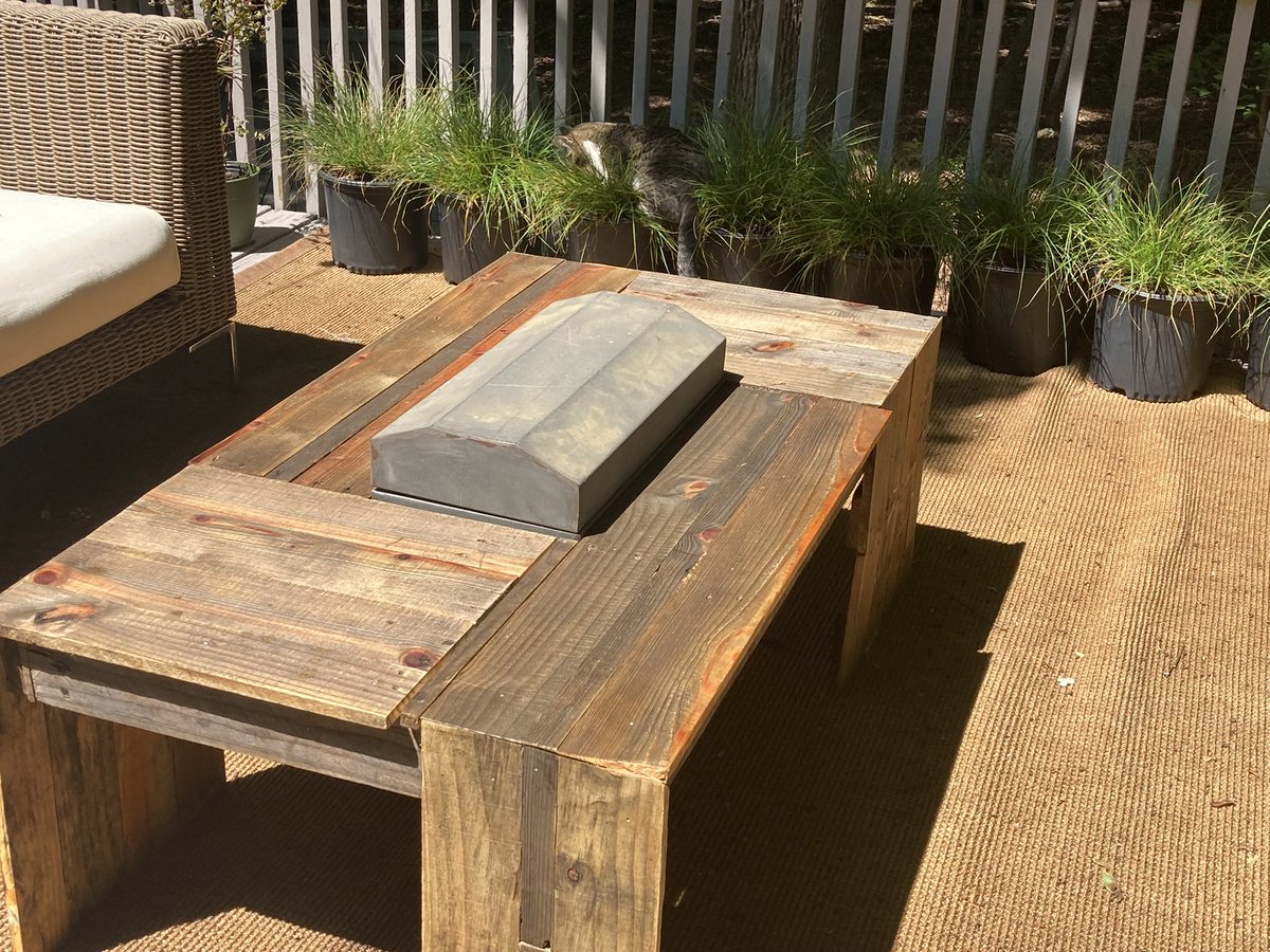 The_MixedCouple's tweet photo. DIY outdoor coffee table we finally did it even Stella approves! Thank you @Remodelaholic for the design! This design reused pallet wood with a natural waterfall feature. Zero dollars spent on lumber. #woodworking #palletwood #waterfall https://t.co/X44e4GVrjG