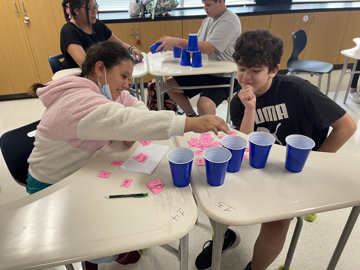 WSISD_Math's tweet photo. Students in Mrs. Gregory’s class showed off their knowledge of the real number system by rotating through a variety of stations, such as Scientific Notation Tic-Tac-Toe, Scientific Memory, and cup sorting with real numbers. https://t.co/aJkyA0hya2