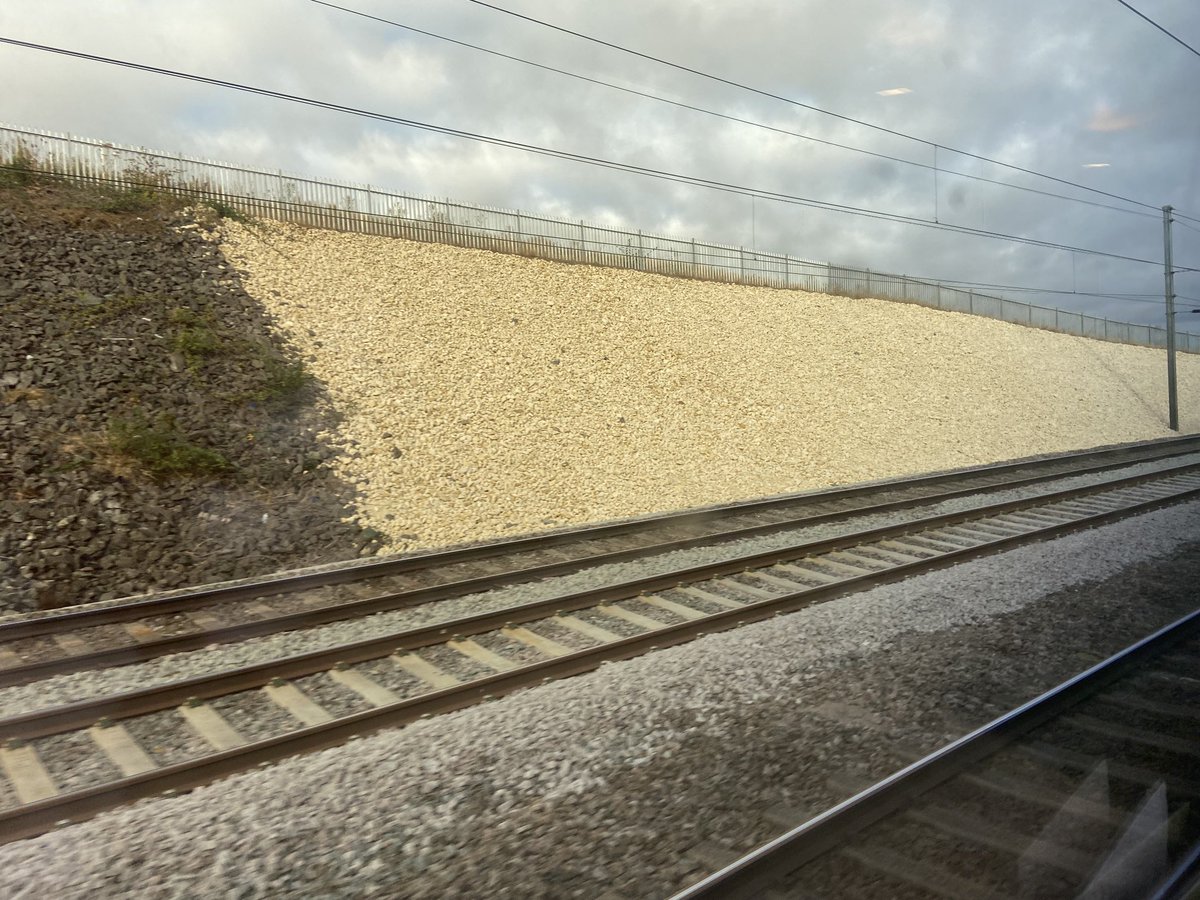 TraceyDagley's tweet photo. Dramatic skies, Fields of gold & lineside banks of new ballast #viewfromtrain #EMR 1C14 https://t.co/TQfP2ppSCv