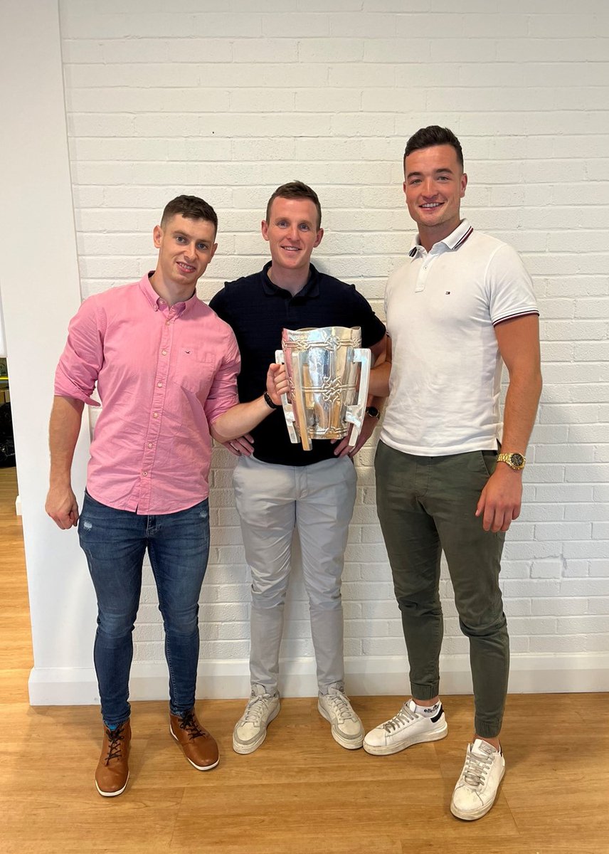 KirbyGroupEng's tweet photo. Kirby team members Barry Murphy, David Dempsey and Kyle Hayes celebrate the return of Liam McCarthy to Limerick for three years running! Colleagues and their families were welcomed to our offices to meet them and get a photo. 
#LimerickCLG #LimerickHurling #LuimneachAbú https://t.co/L7WkoVSICa