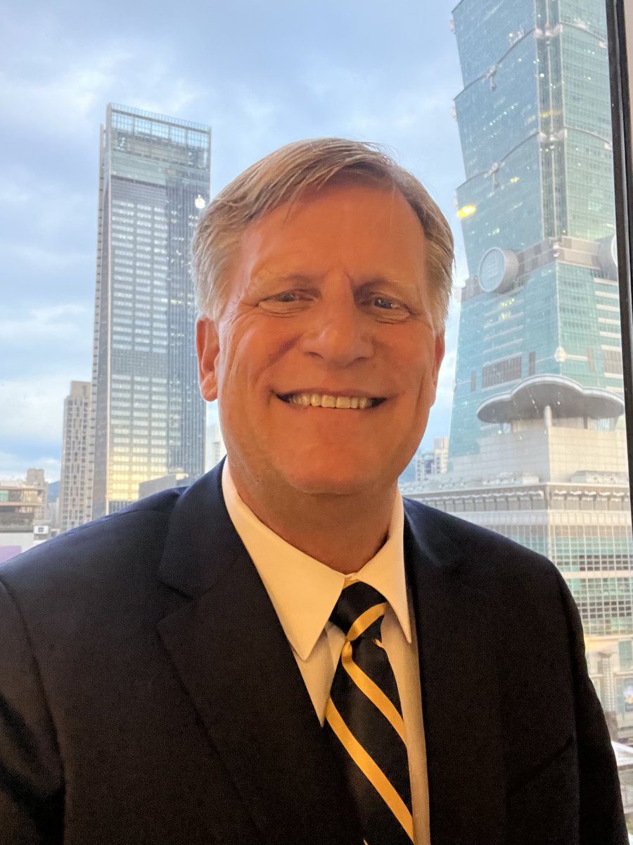 McFaul's tweet photo. Wearing my blue and yellow tie in Taipei today to celebrate Ukrainian Independence Day! #SlavaUkraini ! https://t.co/9k7gCOGHzA