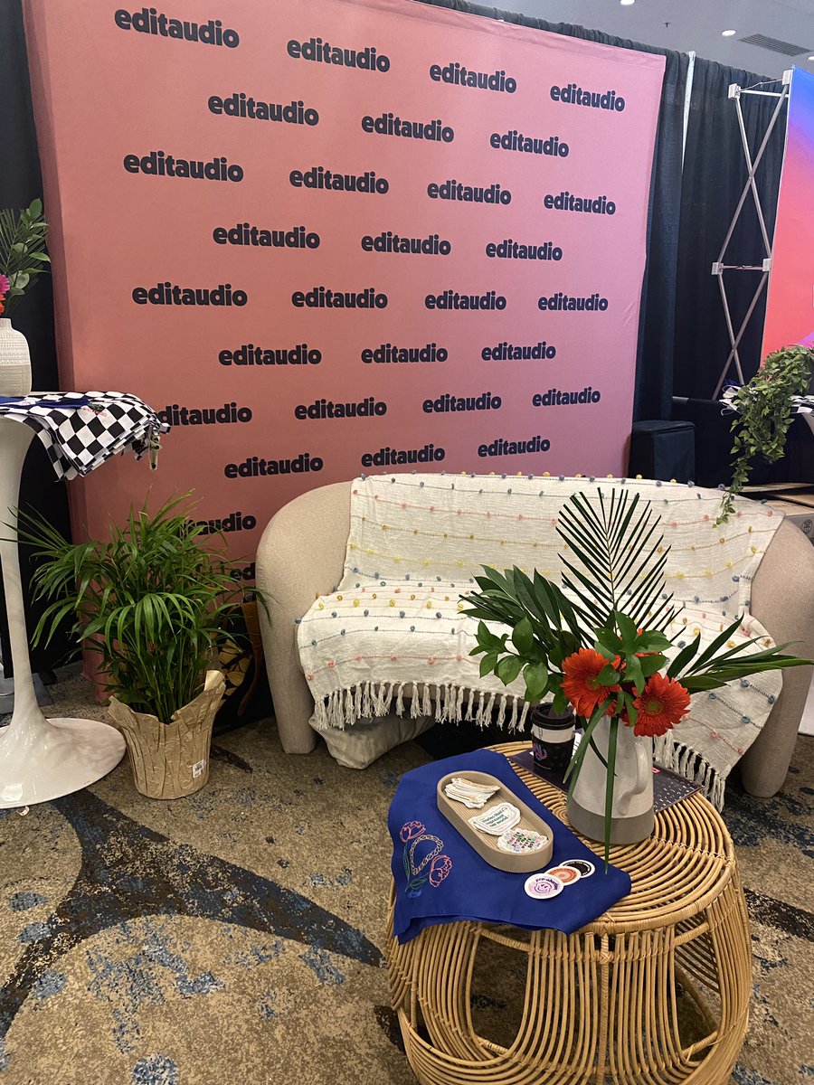We’re here at #PodcastMovement! We have flowers! We have a pop-up podcast booth! We have smiles! Come by our booth and say hey 🥳 #PM22