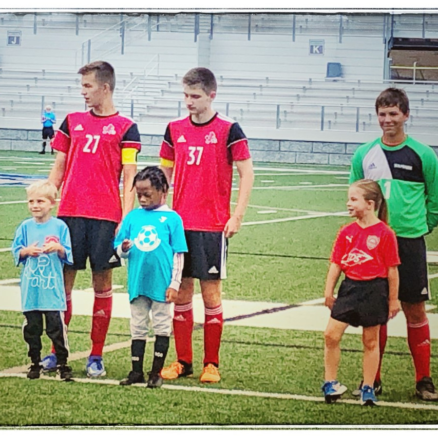 Soccer53590's tweet photo. Our high school athletes are an inspiration to our next generation of players! Some of our youngest athletes were able to escort high school players at this past weekend's alumni game. 

"Little eyes are upon you and they dream of the day they'll be like you." https://t.co/GKIkfSKqaP