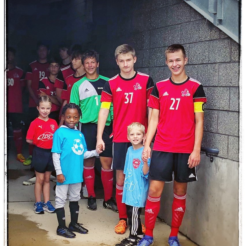Soccer53590's tweet photo. Our high school athletes are an inspiration to our next generation of players! Some of our youngest athletes were able to escort high school players at this past weekend's alumni game. 

"Little eyes are upon you and they dream of the day they'll be like you." https://t.co/GKIkfSKqaP