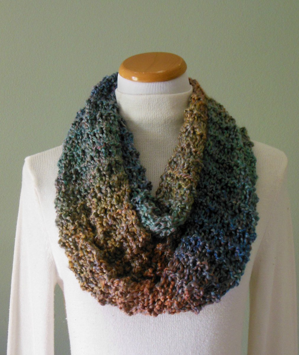 jvozsol's tweet photo. Hand Knit Multi Colored Infinity Loop Circle Scarf in Varying Shades of Blue, Clay, Teal and Ocher https://t.co/YL0X6an7pT #Etsymntt #EtsySocial #FallScarf https://t.co/B3XakgZWdO