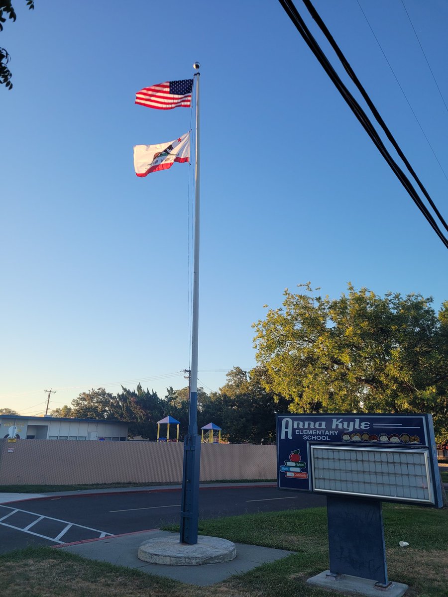 New flags. Finally. Blessed and flying high and proud over the best Elementary School in the District. NOW it's time for school!