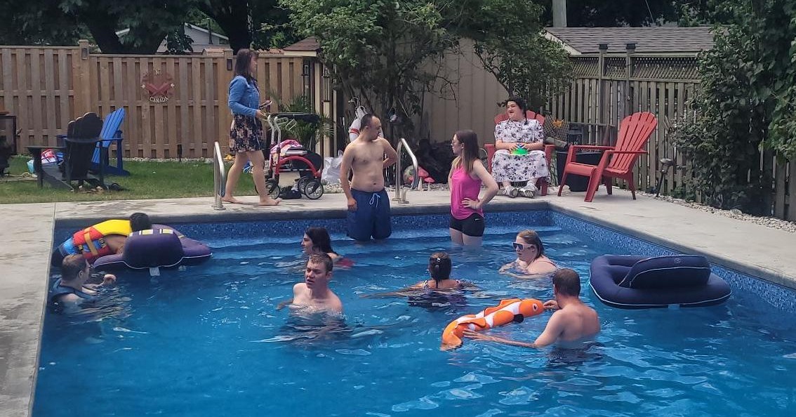 PCL_KW's tweet photo. Thank you Michelle V. for hosting an end-of-summer pool and pizza party at her home for our friends in SIL and the day program.  Ler Ler was super excited to show everybody her swimming skills that she has been working on during her recent lessons at the Waterloo Rec Center. https://t.co/ddOZeJuat0