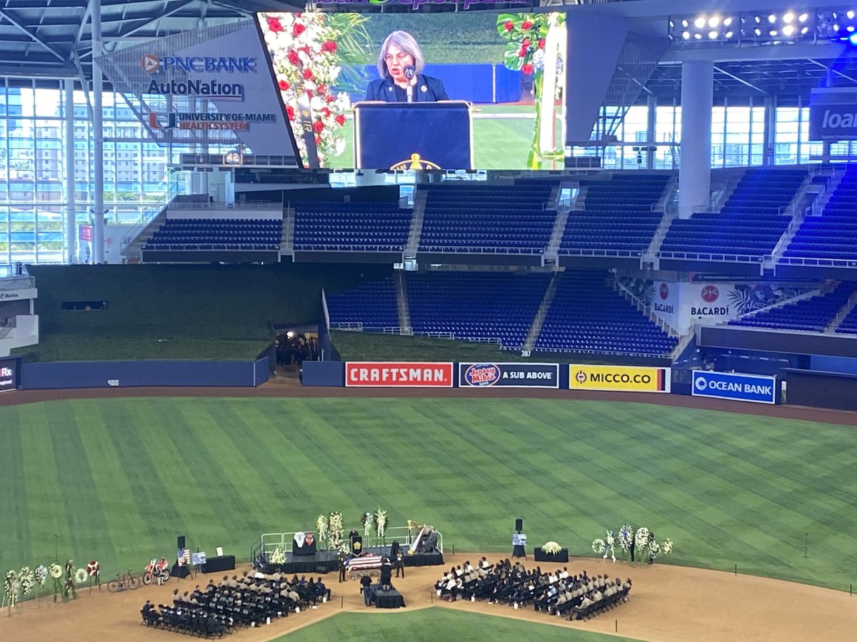 AlyssaHymanNBC6's tweet photo. . ⁦@MayorDaniella⁩ speaking right now at Det Echaverys rendering of honors service: today we remember a beloved son, brother, fiancé, colleague and public servant ⁦@nbc6⁩ https://t.co/RG4oKMwVE7
