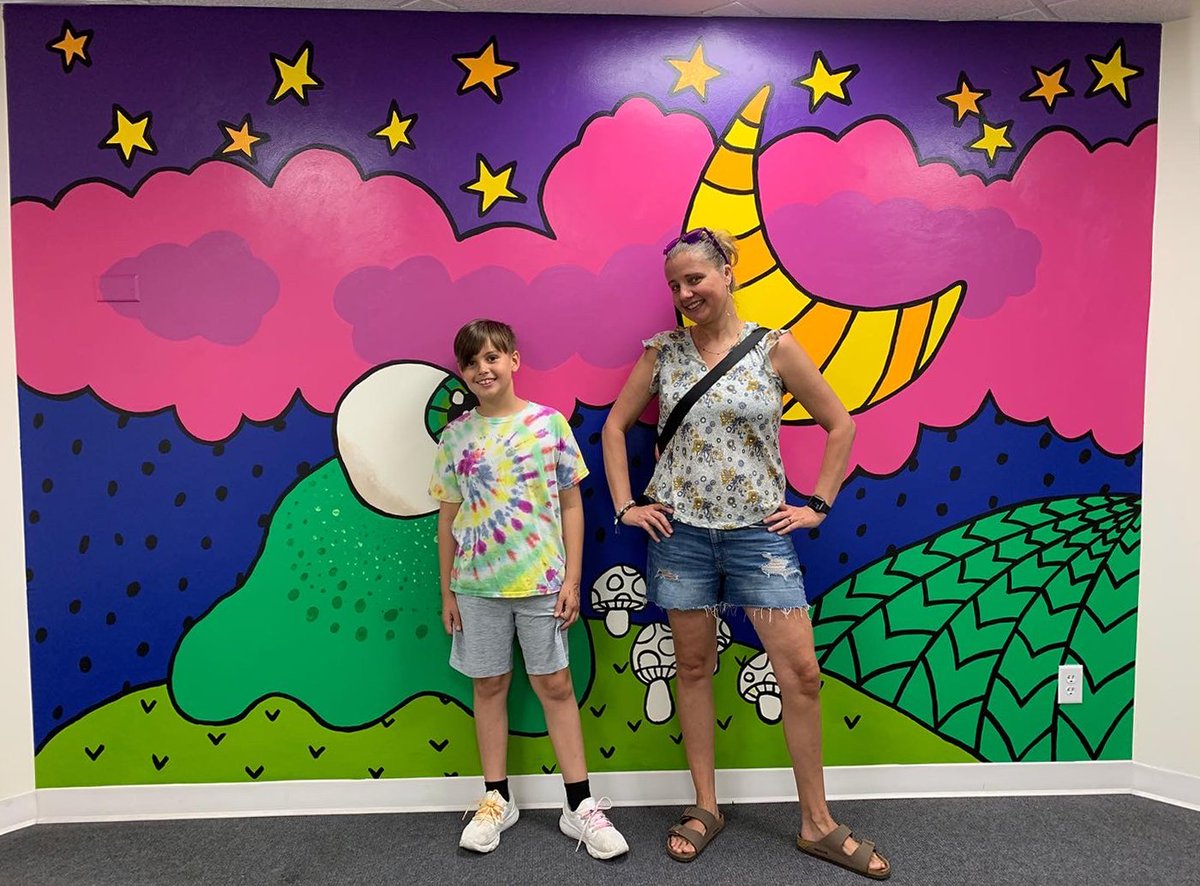 WeAreDesign's tweet photo. Our illustrious Creative Director, Jennifer Whitney, has created an out-of-this-world mural in The LUX building walkway. With the help of her sons Davis and Grant, and special guest Suzy Ammirato, they bring you — SMILEBALL ENCOUNTERS A NEW WORLD! https://t.co/20QhmLOJB5