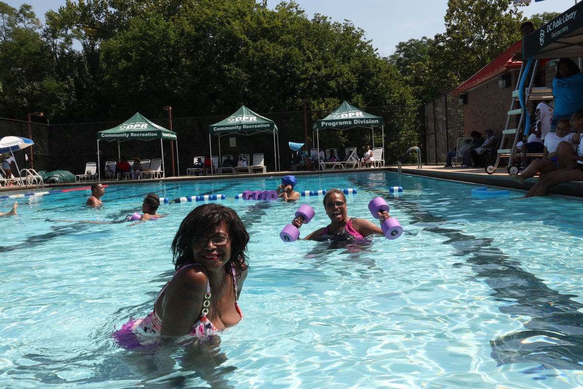 DCDPR's tweet photo. Our Seniors embody #WhereFunHappens! They are having a blast at the “Early Bird Drip” private pool party for #Platinum residents today at Theodore Hagans Pool. #SummerVibes #AgeFriendlyDC https://t.co/fxcxRmyFE0