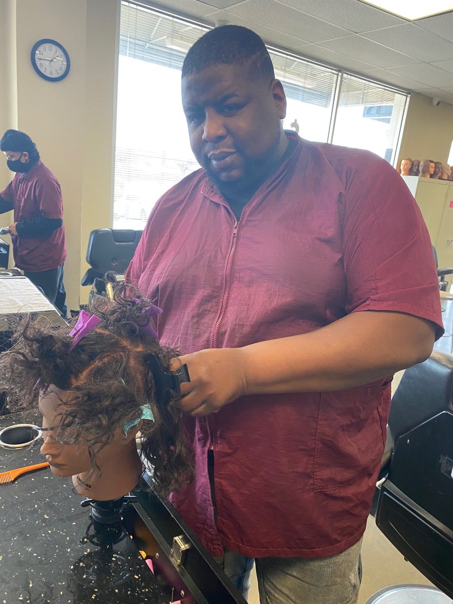 Willie Durant working on the mannequin.