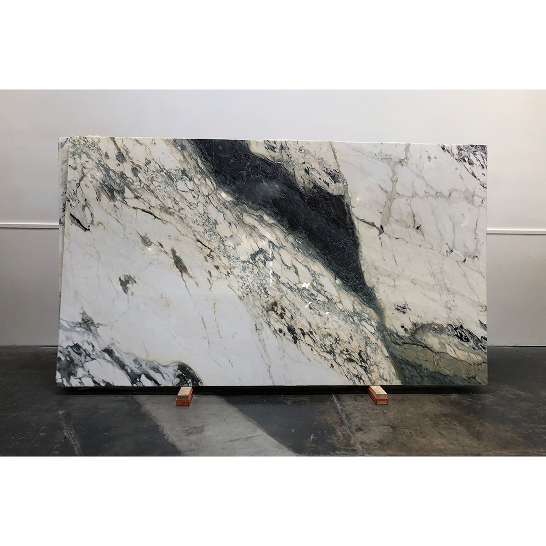 evolvsurfaces's tweet photo. Have you seen our slabs of Breccia Capraia? These gorgeous #Italian #marble features dramatic purples and dark greens set against a warm white background. 
.
.
.
#naturalstone #luxury #kitchen #bathroom #homedecor #decor #homereno https://t.co/QgIkyH1iRA
