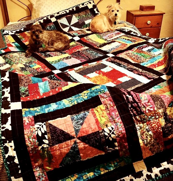 Here’s another quilt. This one is a #CrazyQuilt made from scraps of whatever, no pattern, rhyme or reason. This resides with one of my Nephews. #PupperApproved